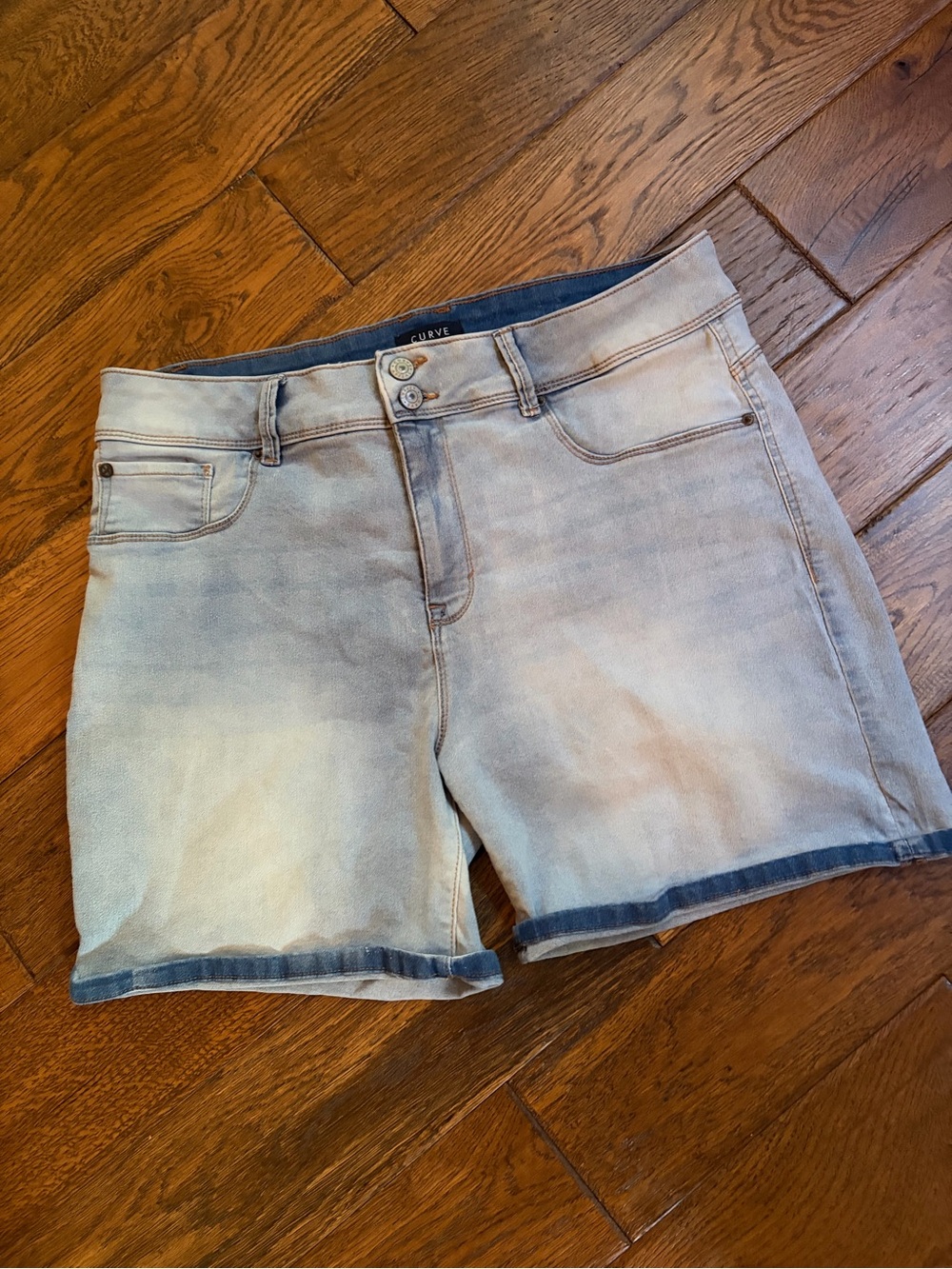 Curve Appeal Women’s Light Blue Denim Jean Shorts with Double Button Waist.